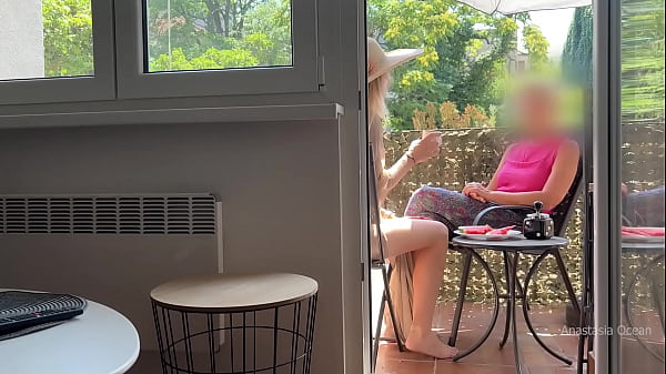 My husband is jerking off and cum in front of my stepmom a while we talk on balcony.